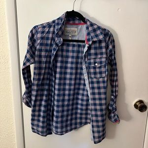 Women’s plaid long sleeve shirt.